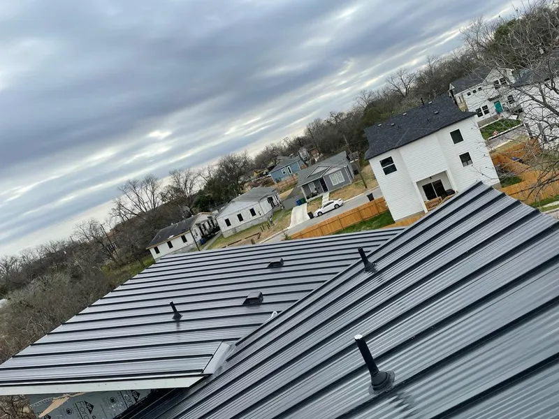Standing seam metal roof panels with vents for Skylight Repair in Huntley